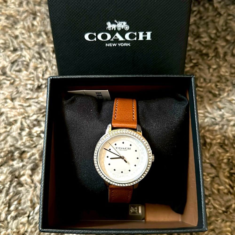Coach watch, never worn! Brown leather band with silver/white watch face.